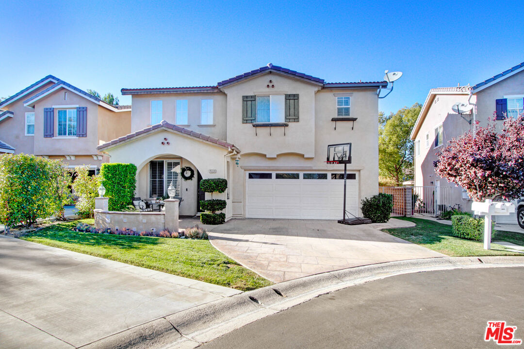24339 Caladium Pl Valencia, California Back-up offers welcome. Sellers have accepted an offer, no more showings at this time. Welcome to this lavish home, located at the end of the cul-de-sac. The home features 3 bedrooms with 3 baths, with over 1800 sq ft of living space. FANTASTIC CURB APPEAL! Stamped concrete on driveway, patio/ porch has custom titles. Downstairs has travertine tiles with wood flooring through-out, and custom molding. Chiefs kitchen has granite countertops with island. Owner's suite, has plantation shutters with an en suite bathroom. Well sized backyard, with stamped concrete, and drought friendly plants. Located next to great schools (Rio Norte Middle School and Valencia High School). Please call listing agent for more information.