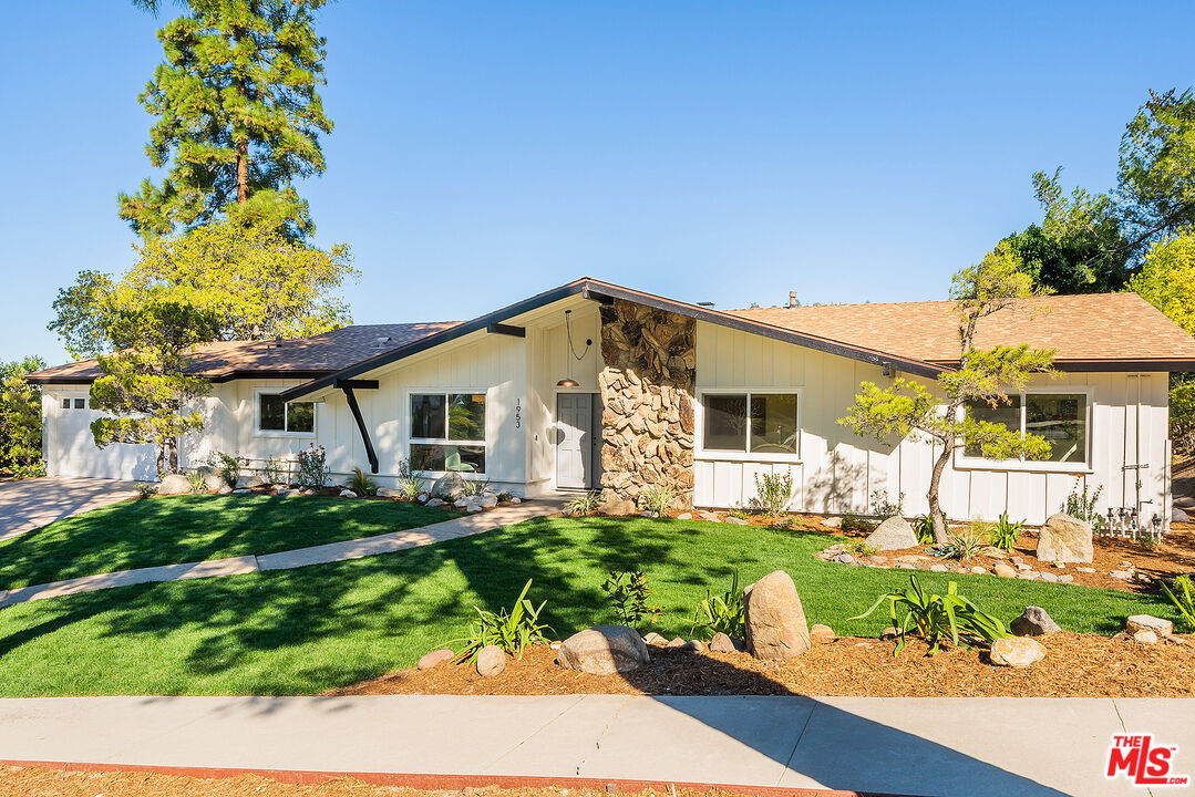 1953 Rayshire St Thousand Oaks, California Gorgeously renovated view home in the desirable New Meadows neighborhood! This spacious three-bedroom two-bath home sits on a large lot, with no expense spared. All new waterproof hardwood vinyl flooring throughout, new lighting, vinyl windows and sliders, all new wiring and electrical panel upgrade, and new plumbing and fixtures. The kitchen has beautiful Calacatta quartz countertops with waterfall feature and lots of storage space in the new kitchen cabinets. All new stainless steel appliances.The living room includes a fireplace and views of city lights. Master bedroom has walk-in closet with en-suite bathroom and double vanity. The backyard has all new drought-tolerant plants, flowers, shrubs, sod, vegetable garden, and irrigation system. Includes two large storage units. Short walking distance to the award-winning Meadows Arts & Technology Elementary School, a Blue Ribbon and California Distinguished School, and winner of the exemplary arts award. This property is located within the Meadows attendance area, giving priority to applicants in the lottery. Centrally located and a short drive to Westlake Village and Moorpark. Enjoy an active lifestyle with easy access to hiking trails, playgrounds, and playfields, and biking through a variety of scenic cycling routes.