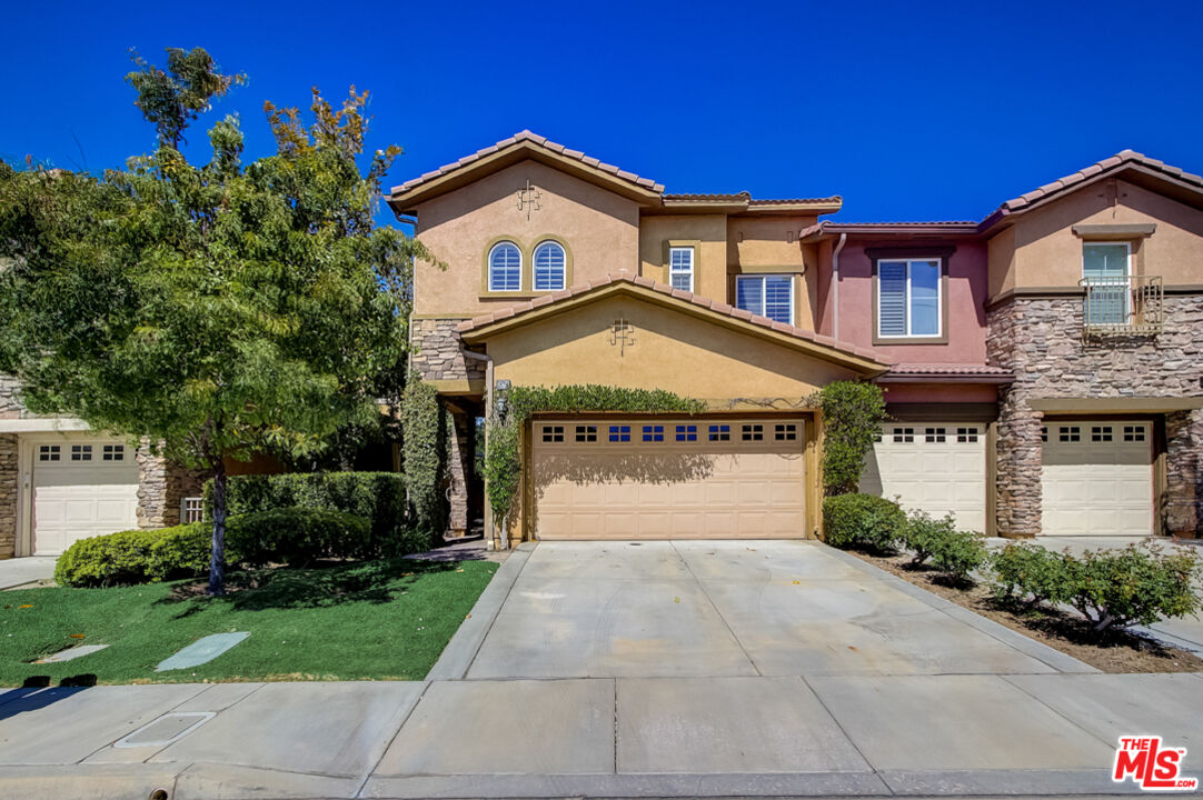 26714 Via Bellazza Valencia, California This Valencia two-story home offers granite countertops, and a two-car garage. This home has been virtually staged to illustrate its potential.