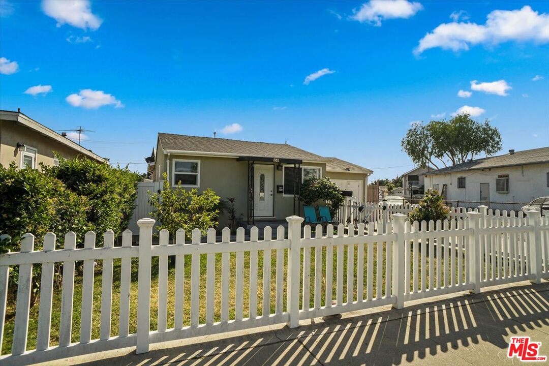 6546 Foster Bridge BLVD Bell Gardens, California Welcome home to this wonderful 4 bedroom and 1 bath Bell Gardens! Perfect for a growing family! Features a driveway with front yard that welcomes you inside to the living room with dining area that has laminate wood flooring that continues throughout the home. Kitchen is modernized with nice open range, beautiful white cabinets, beautiful quartz counter-tops. Master bedroom has two closets side by side with mirror sliding doors. Garage was nicely converted into an additional bedroom and laundry area away from the main areas of the home. Outback, a yard is the perfect place for pets and kids to play and is ready for summer get togethers with friends and family on those perfect evenings. Close to the 5 and 710 freeway for easy access anywhere, Bell Gardens high school, DMV, shopping centers and more, you'll enjoy all that this charming Bell Gardens home has to offer!