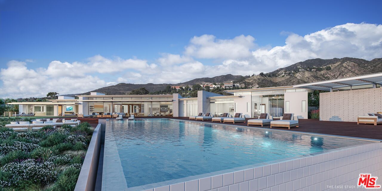 24186 Case CT Malibu, California Welcome to The Edge, the first offering from The Case, a private, 24-hour guard gated sanctuary perched atop Malibu Colony Beach, designed, and developed by Scott Gillen's Unvarnished. Arriving at the guardhouse, itself an architectural gem that sets the table for The Edge, you enter Malibu's most secure community. Situated on 2.6 acres, this mid-century modern inspired architectural triumph, showcases masterful craftsmanship throughout the 5-bedroom, 8-bathroom 10,527 sq. ft. expansive, light filled living space, with 13' ceilings surrounded by walls of glass opening to the approx. 80' infinity edge, fresh water, pool and the 10,000 sq. ft. wrap around Ipe wood deck, ideal for indoor-outdoor living and the fulfillment of any entertainer's dream. The exceptional materials and exquisite details seamlessly lend warmth and livability to this timeless retreat, from its solid teak trim throughout and oversized entrance door to Unvarnished signature hand-hewed, aged white oak floors and its custom tiles and cabinets. The primary suite offers it's own 500 sq. ft. terrace to lounge with ocean views, and the attached 5th bedroom is accessible through a separate, private entrance. Awe-inspiring unobstructed panoramic views spanning from Palos Verdes, the Channel Islands to Point Dume, this furnished home features custom Minotti and original Unvarnished designs, a bespoke Bulthaup chef's kitchen with Miele and Gaggenau appliances, a 650-bottle wine room, and a state-of-the-art media room with "floating walls''. Minutes from Malibu's premier dining and shopping, the owner of The Edge, will be one of the fortunate five to experience an unparalleled lifestyle, in the most exclusive and never to be duplicated enclave on the California coast.