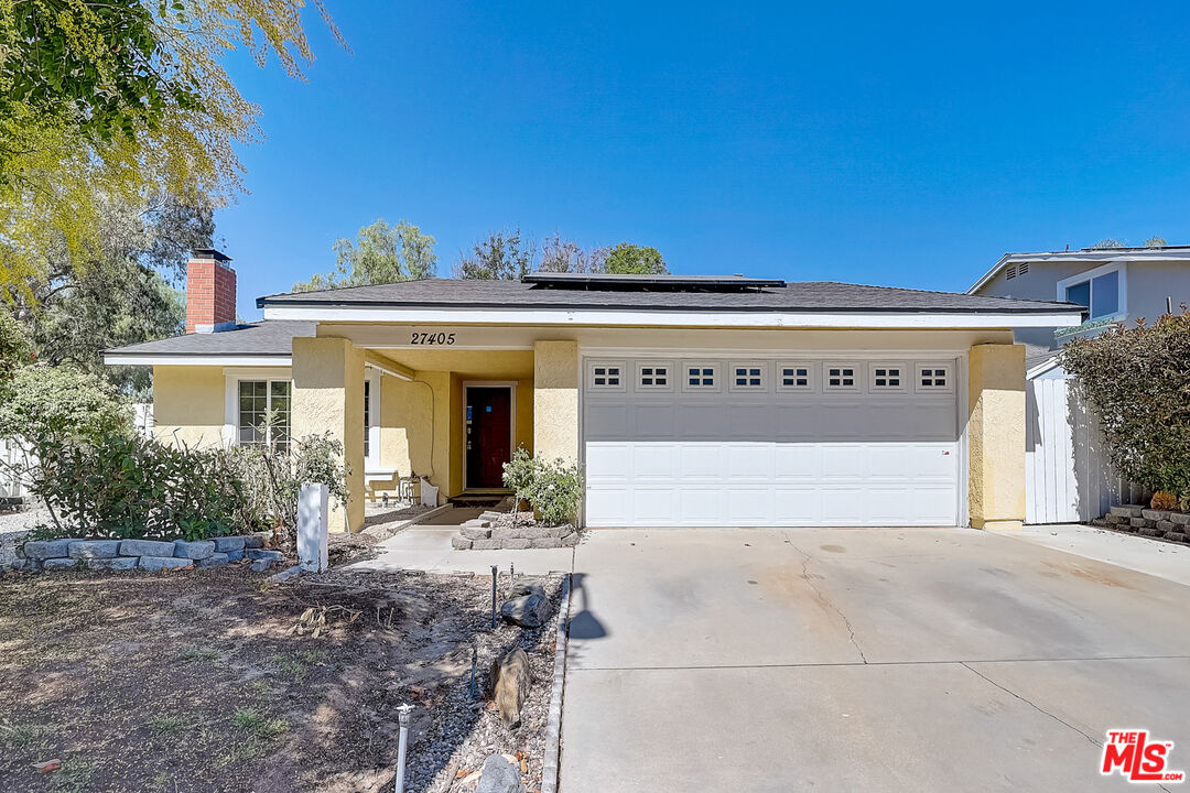27405 Cherry Creek DR Santa Clarita, California This Valencia one-story home offers a patio, granite countertops, and a two-car garage. This home has been virtually staged to illustrate its potential.