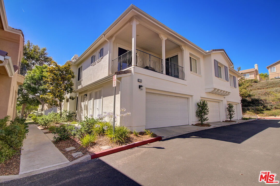 27941 Sirani CT Valencia, California This Valencia two-story home offers a two-car garage.