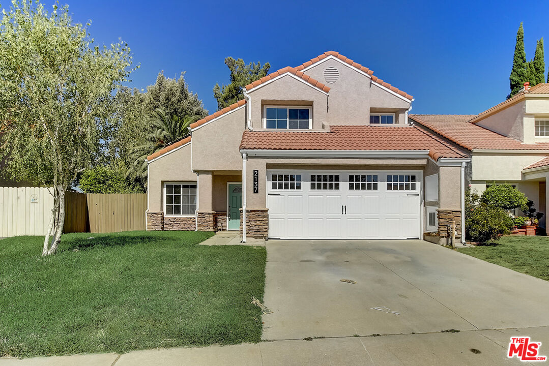 2137 Crosscreek AVE Simi Valley, California This Simi Valley two-story home offers granite countertops, and a two-car garage.