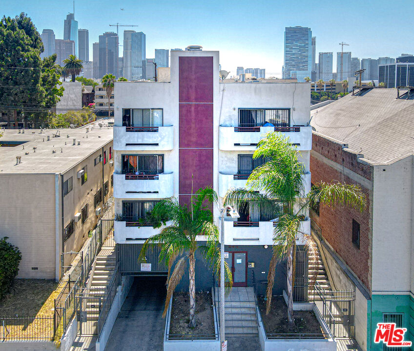 Three story 18 units building with two level subterranean parking built in 1991 (Newer construction), located just west of downtown Los Angeles. Great apartment mix featuring 6 (1bed+1bath) & 12(2bed +2 bath) with balconies and view of DTLA. The property is individually metered for gas and electricity and serviced by one elevator. The ground level features a small lobby and secured parking spaces.  Excellent 1031 tax deferred exchange opportunity with approx. 21% rent upside. Please do not disturb the tenants. All showings will be scheduled upon seller's response to offers. Please review additional docs uploaded in MLS. Call agent for more information.