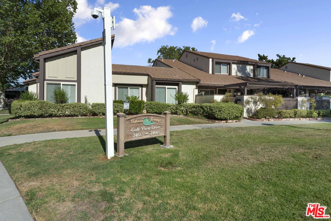24626 Golfview Dr Santa Clarita, California Hidden gem tucked away in the Fairways of Valencia. This 2-bedroom 1.5 bath home is located at the Fairway complex walking distance from the Vista Valencia Golf course and conveniently located near the 5 freeway. This home offers vaulted ceilings, white cabinetry kitchen with stainless appliances, open dining area to the living room, direct access to a 2-car garage with washer and dryer hookups. Water heater is less than a year old! Floors are decorated in laminate wood in living room, kitchen and bedroom, master bedroom and stairs are carpeted, and bathrooms are in tile. Upstairs, you are greeted with a large master bedroom and bedroom both with mirrored closet doors and ceiling fans. Outside, you can enjoy quiet evenings with friends and family in a private patio. HOA and Neighborhood amenities include a beautiful greenbelt, playground, tennis and basketball courts, 3 pools and spa, walking distance to the Vista Valencia Golf course, shopping, top-notch schools, hop-skip-n-jump away from College of the Canyons, and surrounded by the paseos of Valencia! This home is a MUST SEE! Don't Miss This Opportunity! APPOINTMENT ONLY.