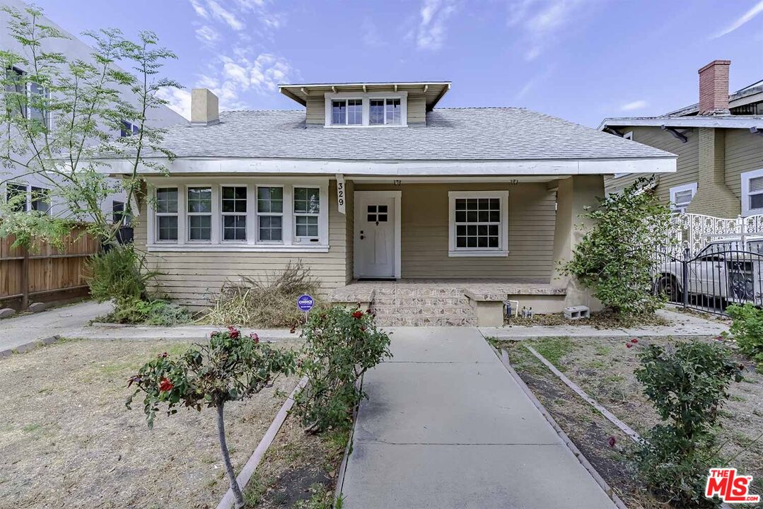 329 N Kenmore Ave Los Angeles, California This incredible 4 BR + 2.5 BA House has lots of updated amenities & located in the heart of K-Town. This Huge 4 bedroom house has desired open floor plan, large kitchen with quartz countertop, high quality appliances, huge hallway, wood floor, washer and dryer in garage, large back yard for plant and coffee, secured and separated TWO parking garage and big enough storage. This house is located in LAR3 Zone & tremendous opportunity of development. Must see!!! WHERE IS, AS IS CONDITION.