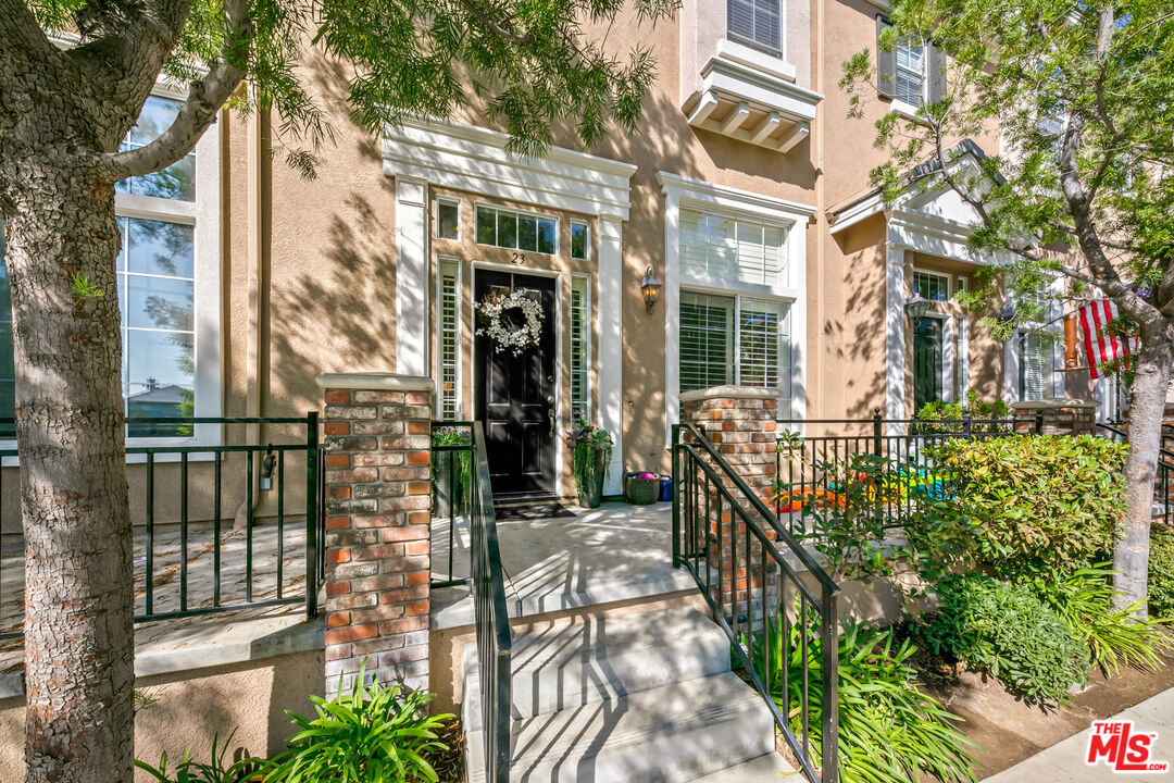 26828 Willow Creek Ln 23 Santa Clarita, California Introducing this beautifully constructed, Victorian inspired townhome, with a MODERN twist, PERFECTLY LOCATED in the sought-after Bridgeport Valencia Community, highlighting its NO MELLO ROOS, is awaiting its new owner! This TRI-LEVEL townhome consists of 3 well-sized bedrooms, 2.5 bathrooms, 1,844 sqft. of living space, and a spacious 2-car attached garage (which boasts extra space perfect for a home gym setup or storage). As your eyes are drawn to the stunning curb appeal, the property's architecture is a complete gem. Making your way inside, high ceilings greet you into the formal living room featuring a charming fireplace and beautiful dark hardwood floors installed throughout. A short staircase leads you to the second level, where you will find yourself landing in the formal dining area, cohesively directing you into the kitchen or stairway to the third level. The gorgeously remodeled kitchen features ample cabinet space, large kitchen island, calacatta quartz countertops, stainless steel appliances, and has a delightful breakfast nook just off the side. The kitchen opens up to the cozy family room, which features handy built-in cabinetry, modern-styled ceiling fan, and plantation shutters (which are also installed throughout the property). Heading upstairs to the third level, you will land in a stretched hallway featuring built-in linen cabinetry and leads to the spacious bedrooms on each opposite end. The master bedroom is a comforting space and has a beautiful bench on bay window, perfect for enjoying a book or morning coffee! The master bath features a separate jetted tub, dual vanities, privacy toilet, walk-in closet, and walk-in shower. The two additional bedrooms are on the opposite end of the hallway (one with a walk-in closet), sharing the well-maintained hallway bathroom. To top it off, the home features a BRAND NEW A/C system installed in 2022. The Bridgeport community offers a PRIVATE LAKE, ELEGANT CLUBHOUSE, POOL, SPA, BBQ area, beautiful walking trails with fountains and gardens around the lake. This home is just minutes to shopping centers, amazing restaurants, large parks and the award winning Bridgeport Elementary School. This is the perfect property in the perfect location, do not miss out on this AMAZING HOME!
