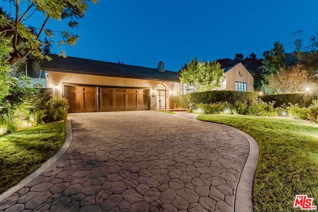5168 Oakwood Ave La Canada Flintridge, California HUGE PRICE REDUCTION!! Recently remodeled! The Sunroom and Yoga rooms are extra rooms, not included in the square footage, all inclusive measured by Flooran is 4,322 square feet. This single story, three car garage (w/EV charger), cul-de-sac pool home has recently been updated throughout! The stunning entrance with mirrored double doors takes you to a beautiful and bright corridor lined with French doors, that opens to the private grassy courtyard. The large chef's kitchen has lots of windows, features a large island with a built-in stove, fireplace and breakfast nook. The formal dining room is connected to the large formal living room with fireplace. The primary bedroom has vaulted beam ceilings, a walk-in closet, full bathroom and direct access to the pool. The exterior has immaculately manicured lawns, courtyard, pool, lounge areas, and stairs that lead down to the hillside landscaping. This home has an absolute resort feel from the greenery and walkways that wrap the grounds. Two separate AC units, 3ton & new 5ton unit, tankless water-heater, new landscaping, new sprinklers, whole house fan, and much more! The owners love this home and have great pride in ownership and it absolutely shows. Great Location! Great Schools! Amazing Home!