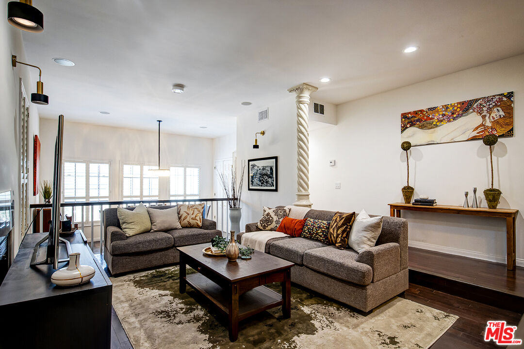 54 N Arroyo Blvd Pasadena, California This is a beautifully refurbished townhouse located in the gated community of Altos Arroyo. The home consists of 3 beds and 3 baths and has an attached 2 car garage. The first floor has high ceilings which give off the feeling of spaciousness, and is equipped with large windows that give magnificent views of the Pioneers Bridge. Bathroom vanities and plumbing fixtures have been replaced with brand new ones, and the kitchen has been refurbished to a modern style with tile backsplash. The master bathroom comes with a huge bathroom that accommodates a walk-in shower, two separate vanity sinks, and a tub. The upgraded light fixtures of chandeliers and recessed lights across the property also provide a classic look. The property has recently undergone maintenance repair as well. The house contains a separate laundry room on the first floor.