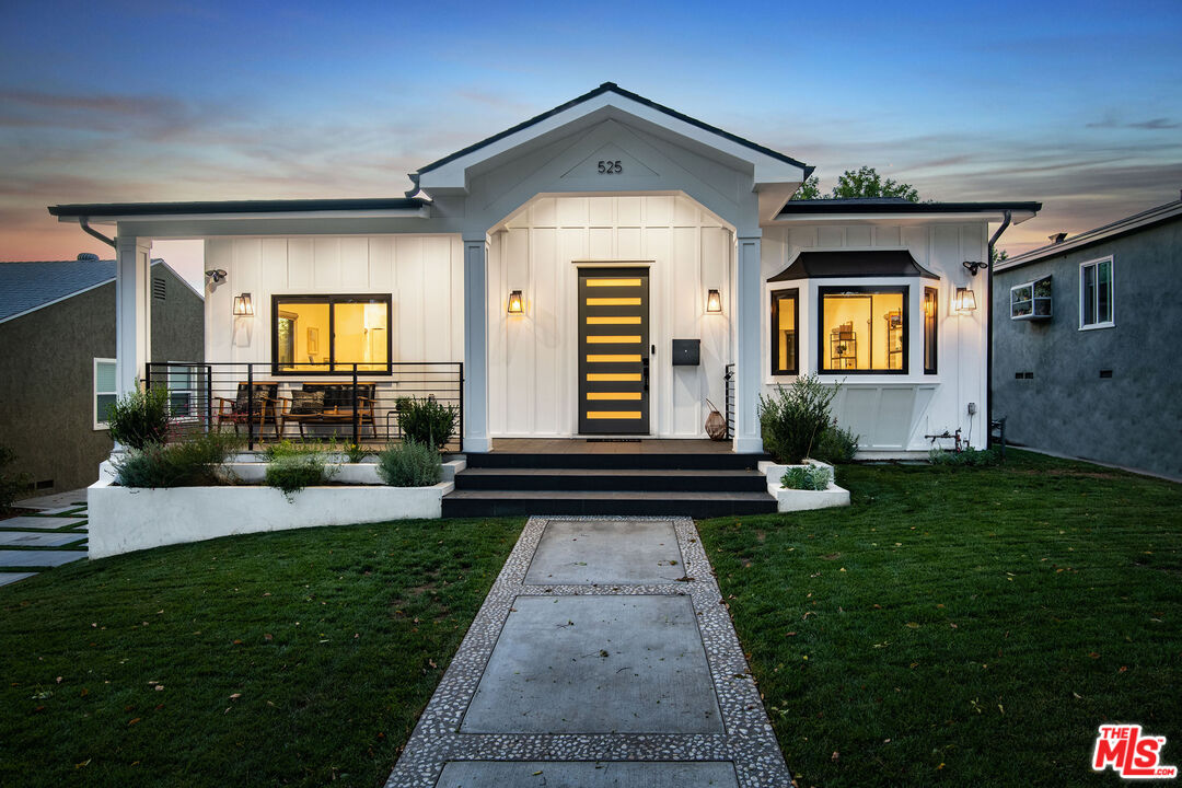 525 Groton DR Burbank, California Glam Farmhouse & ADU! Completely re-imagined! Come home to this stunning 4 bed + 3.5 bath main house, plus 1 bed + 1 bath ADU, set in beautiful Burbank Hills. Fully remodeled & expanded, the original plan was transformed to modern open spaces that flow for entertaining in main house & ADU. No longer a dark enclosed room, the gourmet kitchen is a space to enjoy with a huge island, high-end stainless steel appliances, sleek quartz countertops & gorgeous cabinetry. Open to the dining room & fireside living room, you won't be cut off from socializing while preparing your charcuterie board. Vaulted & dome ceilings add drama. Reset in your main suite with 2nd fireplace, walk-in closet & en suite for two featuring soaking tub, separate shower & dual vanity. 3 more bedroom and 2.5 additional bath finish out the main house. Above detached 2-car garage & two storage spaces is an equally posh 624 sq. ft. permitted ADU with 1 bed + 1 full bath, full kitchen, living/dining, stacked laundry & views of Burbank hills. A perfect location in top school district, near shopping, dining, fitness, entertainment & studios.