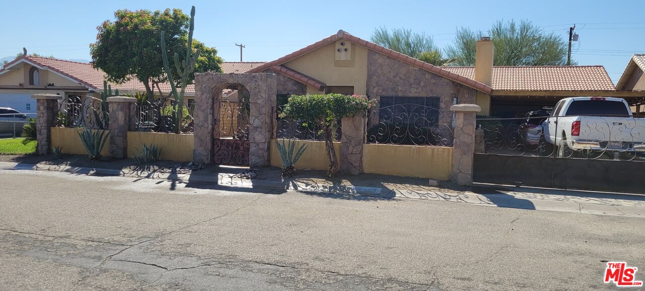 30815 Roseview Ln Thousand Palms, California Beautiful home with large lot. Nice kitchen with stone backsplash, black granite counter tops and black granite Island. Stone fireplace in the living room and another freestanding fireplace outside! Garage has been converted to another room and the laundry is in there. Barbecue outside with pretty stones. pictures have been added!