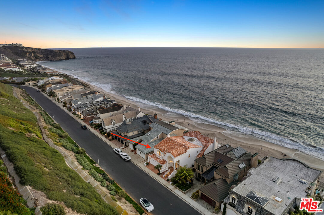 Mesmerizing oceanfront estate with sweeping panoramic, whitewater views, set in the prestigious guard-gated community of Niguel Shores. Front row with direct access to the sand, this spacious 4-bedroom, 3-bathroom residence features 4,343 sf of open concept living with floor to ceiling glass windows that illuminate the incredible ocean views in its entirety. The location is unparalleled on a quiet cul-de-sac street, perfect for a family or individuals looking for a remarkable place to turn into their dream home. Just a short distance to The Ritz, Marina at Dana Point, and downtown Laguna Beach, the distinguished community of Niguel Shores offers residents 24-hour security, several sport courts, parks, professional grade gym, and a large pool. You do not want to miss this rare opportunity to own a one-of-a-kind oceanfront estate!