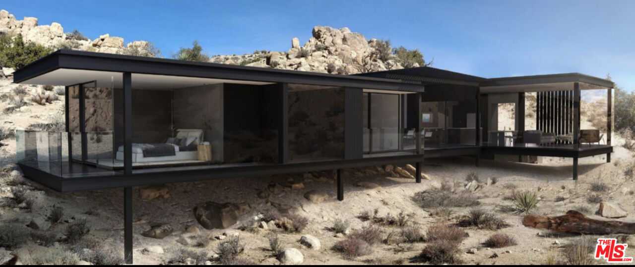 Located in the exclusive neighborhood of Western Hills Estates, this 10-acre compound consists of 3 contiguous plots that sit on top of rare and beautiful rock formations overlooking Yucca Valley. Plot 1: 1.25 acre with fully functioning 325sf cabin with bathroom, kitchen and patio. Plot 2: 5 acres with two 325sf cabins - one including a kitchen and the other functioning as a studio. Includes storage unit with washer & dryer. Additional building plot occupying one of the highest points in the valley, with 360 degree views. Plot 3: 3.75 acres with 3 private bowls of boulder formations and pinion pines. Includes two building pads on the edge of the boulder bowls. Unobstructed, secluded views.  Plans fully approved with Yucca Valley for modern glass and steel one-story home, including engineering plans for access road and foundations. Renderings included. Enjoy a slice of Joshua Tree National Park in your own backyard with unique building opportunities and forever views