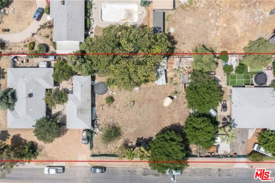 15105 Plummer St North Hills, California This is an exciting opportunity to own almost an acre of land in North Hills, 30 mins from Santa Monica and 40 mins from Downtown. Income property opportunities as well. Enjoy the privacy of this property while utilizing the vast space that can either be developed or kept empty for whatever you like. The property is also zoned LARA so you can raise farm animals here. Motivated Seller. Two Houses in one big Lot, Legal Duplex (2) 3 bedrooms 2 Bath Homes on 30,210 sqft flat corner lot, combined building sqft being 3,150. Build your dream home or build multiple homes. SB9 recently passed, may allow you to build 3 additional homes on the lot. New developments and renovations are happening throughout the area. You can also build a sizable home with a pool and an ADU on the lot. This home is in a desirable, proximity to the freeway. Perfect for an investor, builder, contractor, or savvy end-buyer who wants a trophy property in a premier location. Buyer to do their own due diligence and investigations. Call now for seller credit options!
