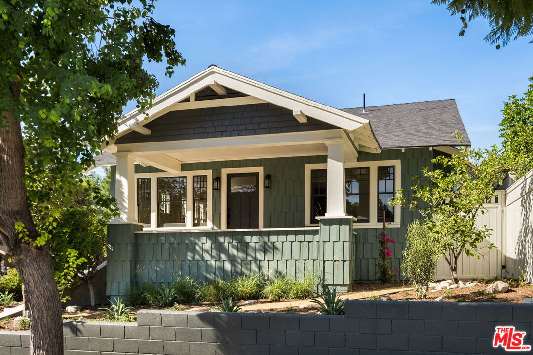 501 Nolden St Highland Park, California Perched on a beautifully landscaped knoll of Highland Park sits this enchanting craftsman. A one-of-a-kind gem that has been meticulously transformed, keeping true to its historical charm and architectural detail. Upon your arrival, you'll make your way up grand sweeping stairs onto an inviting front porch, a proper greeting to an airy open floor plan filled with energetic light all year round. Through oversized storybook windows, you'll enjoy the surrounding greenscape with dabs of colorful flora, floating butterflies, and chirping birds. The living room is spacious, with custom built-in cabinets and a media center. Large dining area can easily seat the entire family. Two sizeable bedrooms, a primary en suite with dual closets, and direct access to a private seating area and sun basking platform. The primary bathroom has a custom double vanity, tiled floors + walls, a frameless open-air shower, and an oversized cast iron soaking tub. The kitchen is timeless and luxurious, with custom cabinetry, a center island with comfortable seating, a full suite of high-end appliances, and stylish finishes. Finally, at your leisure, go alfresco, open your custom accordion windows, and connect your home to its magical backyard. There you'll discover a picturesque landscape with plenty of zones to enjoy, an expansive deck to dine and entertain, a firepit area, generous grass space, an epic rooftop lounge with hillside and sunset views, and direct access to an oversized two-car garage, ready for EV connection. Laundry closet with washing machine and dryer included. Roomy accessible attic for extra creative space or storage. California basement. ***The property qualifies for the FIRST REPUBLIC BANK EAGLE COMMUNITY LOAN PROGRAM 30 YEAR FIXED BETWEEN 3.5% - 4.5% DEPENDING ON LOAN AMOUNT, call your local First Republic Bank for details*** New: foundation all around, electrical rewire + panel, exterior siding, interior + exterior paint, windows, plumbing supply + drains, flooring, fixtures, doors, tankless water heater, insulation, HVAC + ducting, all cabinets, garage door + motor, sprinkler + drip system, deck + rails. Centrally located in Highland Park, enjoy the best of York & Figueroa within a 10-15 min walk. Highland Park Bowl, Home State, Civil Coffee, Cafe Birdie, Good Housekeeping, The Lodge Room, Gold Line Bar, The York, Dotter, a Bloc, Highland Park Brewery, Cafe de Leche, Joy, Donut Friend, Bob Baker's Marionette Theater