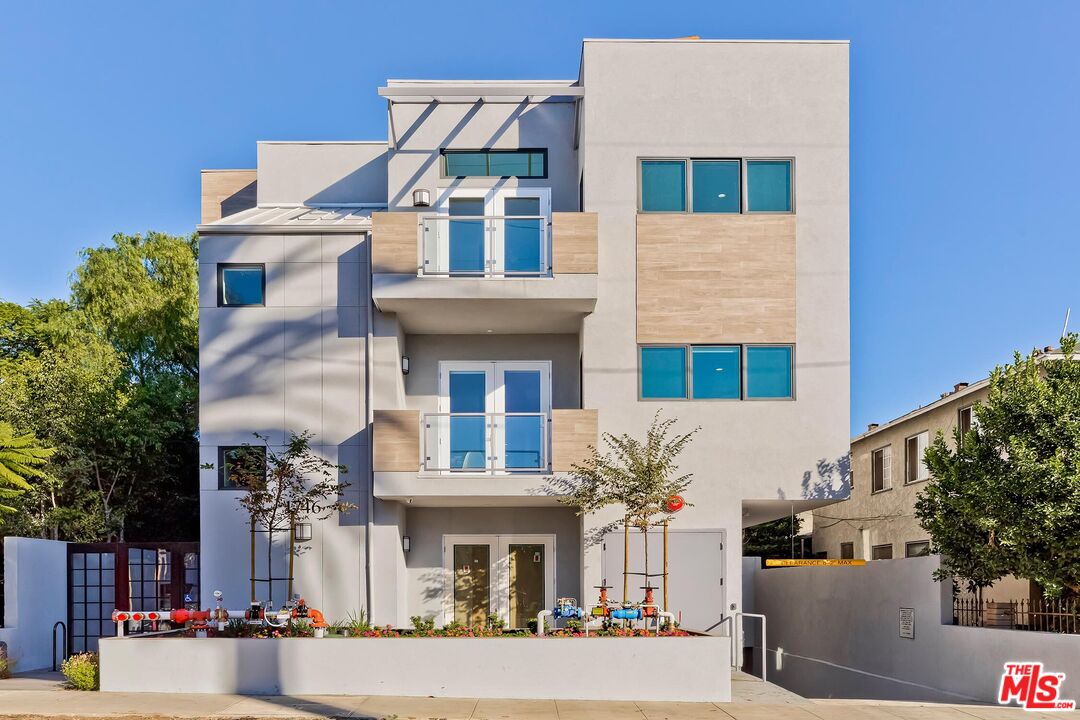 THE GARFIELD9 CONDOMINIUMS: Priced from $1.225M to $1.450M.  Nine luxurious condominiums located in one of Hollywood's hippest neighborhoods.  This luxury condominium has it all.  No expense has been spared.  3 bedrooms + 2.5 baths. Formal entry, powder room, large living room with west-facing balcony, chef's gourmet center island kitchen with designer cabinetry, quartz countertops, and top-of-the-line G.E. Cafe Series stainless steel appliances.  Spacious primary suite with large walk-in closet.  Primary bath with dual sinks, spa tub, and large walk-in shower.  Two light, bright, sunny secondary bedrooms.  Secondary hall bath with dual sinks and shower-tub combination.  Additional amenities, features & highlights include, but are not limited to: Engineered wide plank oak floors, upgraded interior doors with opaque glass, 10-foot ceilings, recessed & LED lighting throughout, laundry closet with large-size G.E. washer & dryer, large designer linen cabinetry with quartz countertop, CAT5 wiring, Decora electrical switches, tandem gated underground parking and much much more!  See the Amenities ~ Features and Highlights List in the Documents Tab above for a complete list of all amenities, features & highlights.  This luxurious condo is located in East Hollywood on the border of Los Feliz and surrounded by some of the area's hippest hotels, restaurants & markets such as the new Cara Boutique Hotel, Restaurant & Bar, Levant Mediterranean Cuisine, Bolt, Lazy Acres Natural Market and Gelsen's Franklin Village Market.  Close to all eateries & shops on Hillhurst & Vermont Avenues in the Los Feliz Village.  Also close proximity to the Metro-Subway, Griffith Park, and Observatory, hiking trails, Greek Theater, Thai Town, Little Armenia, Franklin Village, Hollywood Galaxy Target as well as the American Film Institute, Immaculate Heart Middle & High Preparatory School, and the French Lycee International School of Los Angeles.  Minutes to Downtown LA, Hollywood & Vine, and the San Fernando Valley via the Metro-Subway.  Also, minutes from the Beachwood Canyon Hollywoodland Village & Gourmet Market, Hollywood 101 Freeway, Los Feliz East & West Villages, Silver Lake, and all Hollywood Studio.  In short, in the center of it all.  Don't miss and come see this very special condo!  BROKERAGE DISCLOSURE: Broker, Broker's Agents, & Sellers do not represent and/or guarantee the accuracy of the square footage, permitted or unpermitted space, bedroom/bath count, lot size/dimensions, schools, or any other information concerning the conditions or features of the property & surrounding area. Buyer is advised to independently verify the accuracy of all information through personal inspection and/or investigation with appropriate professionals and to fully satisfy themselves regarding all material issues regarding the property, neighborhood, and surrounding area.