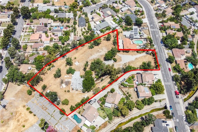 Huge Price Reduction!  Large Development Opportunity in a rare residential land in "Avacado Heights".  2 Parcels for one lot with an existing one residential house. (APN #8110-004-073 & APN #8110-004-082), total of 2.098 Acres, lots of potential, Possibilities to build up to 15 PUDs (detached homes).  Soil Report is completed.  There is a single family house with 4 bedrooms 3 baths plus a Den leased out for $2200/month.  Long term tenant, month to month only.  Seller tried to subdivided the lots before pandemic, architect went to one hearing with the county.  Then the project stops due to pandemic hit.  The property is very centrally located, close to Freeways, school, and shopping centers.  A rear development opportunities for builders, developers and investors.  Price to Sell!