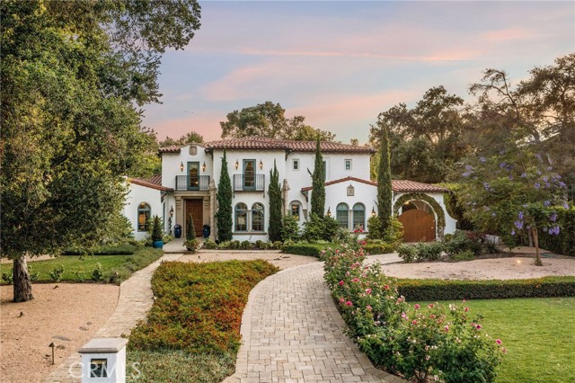 This spectacular Mediterranean style home sits in the prestigious Santa Anita Oaks neighborhood on a huge 29,066 sqft lot. Built by Mur-Sol and designed by the renowned Robert Tong, this mansion features 6 Bedrooms and 10 Baths with 9,818 sqft of living space. When you walk past the dramatic tree-lined entrance, a dramatic foyer greets you with a grand two-story ceiling, a dazzling chandelier, and gleaming stone floors. A sophisticated living room welcomes you to this warm home with wood floors, an elegant fireplace, and ample room for a grand piano. The state-of-the-art gourmet kitchen features granite countertops, a grand kitchen island, high-end Wolf appliances, exquisitely custom crafted cabinetry, walk-in pantry, and informal dining room. This home also has a separate Wok kitchen and formal dining room. The bright and expansive family room boasts a custom wood-coffered ceiling and is enhanced with a beautiful wet bar, temperature-controlled wine room, and a breakfast nook. The lavish upstairs master suite is spacious with a cozy fireplace, study, custom designed walk-in closet, and a picture window overlooking the back yard. The master bath has dual sinks, a large steam shower, a soaking tub, and top of the line fixtures. Three additional bedrooms upstairs are all en suite and feature distinctly custom designs as well. The second master bedroom & another suite are downstairs. There is also a fully equipped home theatre, paneled library, and an incredible home gym with its own bathroom and sauna. Sliding doors open to the extraordinary and truly beautiful backyard. The stunning resort-style yard provides a vaulted covered patio with built-in BBQ, salt-water pool, and spa with fountain - a perfect place to relax and enjoy this beautiful, private surrounding. A well-appointed pool house of 688 sqft is included in the living space and has a 3/4 bath. Additional property amenities include an elevator, an 8-zone security camera & alarm system, central air conditioning with zone controlled smart thermostats, attached 3 car garage with direct access to the house, automatic gate, and tankless water heaters. The property received a Spring Home Award for its beauty, landscape, and design from the City of Arcadia in 2017. Conveniently located near schools, the Arboretum, Santa Anita Mall, park, golf course, racetrack, fine dining, and entertainment. Easy access to 210 Freeway. Award-Winning Arcadia Schools! The upscale furniture designed for the home is for sale.