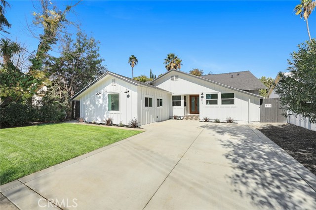 Welcome Home! This gorgeously remodeled California Ranch home is situated in the heart of North Hollywood. Originally constructed in 1958, and thoughtfully redesigned in 2022, this home is sure to please as your perfect family home, great for entertaining in your own private oasis. This single level stunner features 5 bedrooms and 3 bathrooms, a large living room, dining area, and open kitchen, and a gorgeous backyard with a sparkling pool and patio. The kitchen is well equipped with stainless steel appliances, white carrara quartz countertops, gold hardware and pot filler, and a large eat-in counter with seating for 4. The adjacent dining area and living room has two sliding glass doors which open to the sparkling pool and outdoor patio. The primary suite is equipped with 2 closets and an envy inducing en-suite bath equipped with a dual sink vanity and an oversized shower with designer tile and custom smoke tinted glass door. Conveniently located near neighborhood shopping centers, grocery stores, schools, and parks, 12413 Debby St is not to be missed!