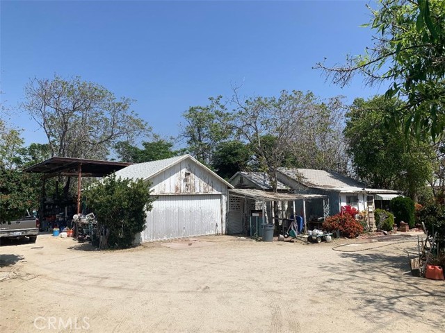 Agents: Another  property located and highly sought after ZONED BL/RS-1-AA which allows owner contractor/operator of heavy equipment to park it etc.....Corner lot very easy to park and move equipment... Agents and buyers to verify with the County of San Bernardino as to uses.