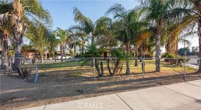 Amazing 11,761 square foot corner lot home with 3 bedrooms, 1 bath. DO NOT DISTURB TENANTS. Great opportunity for developers or investors who are looking to construct in the growing city of Moreno Valley. This flat and valuable land. All information is to be verified and satisfied by the buyer's own due diligence.