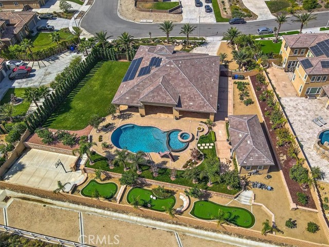 Price Reduction***2018 Bella Vista Estate*** Luxurious Single Story Home w Detached Casita / Spectacular, One of a Kind, Oasis Resort-Style Backyard / Panoramic Views of the Mountains in the Foothills of Rancho Cucamonga.  The Owners have SPARED NO COST in Designing their Truly Exquisite Paradise that took almost 18 months to complete.  Over 900K of High Quality Upgrades has been spent for the Interior and Exterior of the Home, Especially the Completion of the Resort Style Living that this home has to offer. This Unique Home has 3369 sq. ft. of Modern Open Concept Living / 4 Bedrooms / 3 1/2 Baths / Detached Casita with an Additional 593 sq. ft. making the total Living Space 3962 sq. ft. and it Includes a Kitchen & Bathroom w Shower / Almost 3/4 of an Acre has been Completely Designed and Landscaped with a Modern Pebble Tec Swimming Pool, Including a Kiddie Pool & Spa / Basketball 1/2 Court / 3 Putting Greens with 10 Holes and Seating Area / Extended California Patio - 793sq. ft., has Travertine, Fireplace and is Equipped with Outdoor Speakers / Over 20 Fruit Trees / RV Parking / 3 Car Garage / 10KW Paid Off Solar with Tesla Powerwall AND if that's not enough to convince you, the Home Comes with Incredibly Low Taxes-Approximately 1.08% with NO HOA.  As you Enter the Home into a Spacious Great Room with Vaulted Ceilings / Crown Molding / Luxury Vinyl Flooring / Fireplace / Surround Sound Speakers / and a Bifold Door that Completely Opens Connecting the Great Room to the Outdoor Patio which includes a Cozy Fireplace to Enjoy Breathtaking Mountain Views. The Highlight of the Home Includes Many Entertaining Spaces, it has a Large Dining Area that flows into the Gourmet Kitchen with an Expansive Island.  Directly off the kitchen is a Breakfast Nook and office that connects you to the living areas, plus a Separate Activity Room/Den.  Two of the home's Secondary Bedrooms share a Jack & Jill Bath, with another bedroom featuring a Full Bath Ensuite- Perfect for Guests or In-laws.  The Spacious Master Bedroom Retreat includes a Spa Inspired Bath with an Over-sized 6 Jet Whirlpool Tub with Inline Heater, Oversized Shower, Dual Vanities, Dressing Table and Walk-In Closet.  The Home belongs to the Award Winning Etiwanda School District, 5 minutes away from Victoria Gardens, and the 15 & 210 Fwy are close by. This Home has too Many Details of Fine Living to Mention and you must Come and See it for Yourself.  This Home is a True Gem!!!