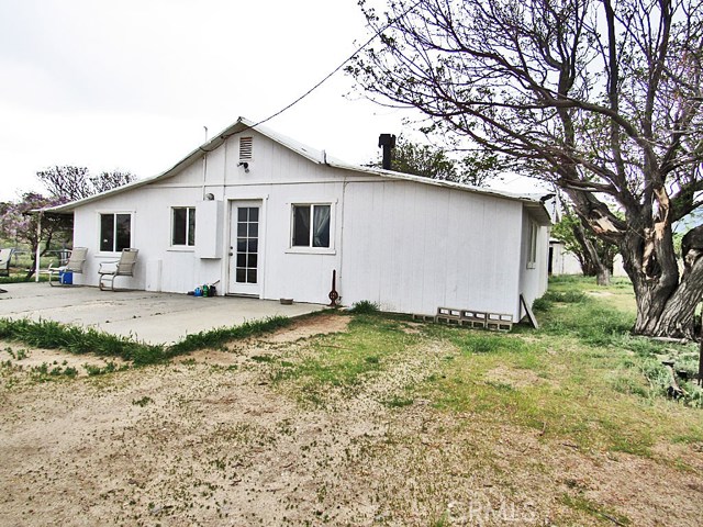 Parcel 3279-001-026 is +/-25.78 Acres. Zoning is A-2 (Heavy Agricultural). Located in Unincorporated Los Angeles County. This home is 2 bedroom 1 bath 965 sqft. Original build date is 1941 effective date is 1952. On paved frontage 3 Points Road. About 3,161 ft to HWY 138. PIQ straddles the boundary line of the Antelope Valley Water Adjudication. AVEK is the water agency that oversees the Antelope Valley Water Adjudication. All utilities, zoning, and uses should be further verified by buyer and buyers agent. Conditions may exist where over time work was unpermitted to this structure.