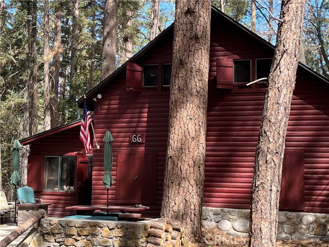 Back on the market. It is along story but you, as the new buyer, will benefit as we already have septic clearance and other reports done. This property is one of the most stunning of it's kind and is a MUST SEE for those looking for a large , vintage looking, historic, cabin, with all the modern amenities. When you close your eyes and picture a mountain cabin, this is what you will see. There is electricity, water and propane. There is plenty of room for big family and friends to come visit. Three bedrooms. Master bedroom PLUS one bedroom has bunk beds to sleep four and the other has bunkbeds to sleep two as well as plenty of floor space. As a bonus, the 900 sq/ft garage has been mostly converted to accommodate even more. The two lofts even add 150 sq/ft to the converted garage. The cabin will come mostly furnished with furniture and decor from antiques to mid century modern and even some newer pieces. Even the refrigerator is a replica of a vintage refrigerator that you might have found up here many years ago. The rest of the kitchen is vintage including the cabinets, decor and sink. Do you need a workshop? This one has one. The current owners have put in a new water heater, new paint, new roof, screened most windows, and have furnished it in the most comfortable and livable cabin that you will probably find....Perfect for generations to come. That is, if you are looking for that sort of thing. This cabin is on land leased from the Forest Service, and as such, it is for a cash sale only. Some restrictions apply, such as, it cannot be rented out and it cannot be one's principal residence. Forest Service Handbook available in the Supplements or on request for more information.