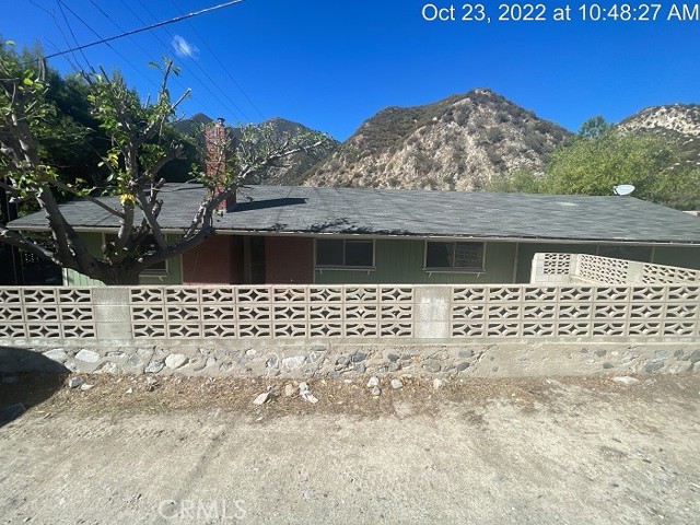 WOW what a great opportunity to own this 3 bed 1 bath home in Lytle Creek area with the creek just a few yards away and plenty of room for an ADU as well.  Just bring your working gear and make this diamond shine.  Home is fully fenced and has its own water.