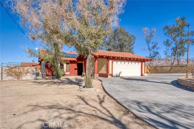 This home and Accessory Dwelling Unit (casita) sits on 10 acres conveniently located right off the Hwy. When is the last time you have seen a basement in the area? The basement has electrical power, block walls and is truly a "cool" place to be. This home has a central HVAC system, is on natural gas and has solar. Inside the main home you will find a living room, separate family room (w/fireplace), 3 bedrooms and 2 bathrooms. The large kitchen has granite counters with plenty of workspace, built-in oven, built-in range and comes with the refrigerator. Exit from the family room and enter the large covered patio. What a great space to have that gives you so many options for its use. The casita is a 1 bedroom 3/4 bath unit. It also has a private patio with a storage room that has power and gas. Time to relax? Just walk your 10 acre parcel! Or sit in your cool basement!