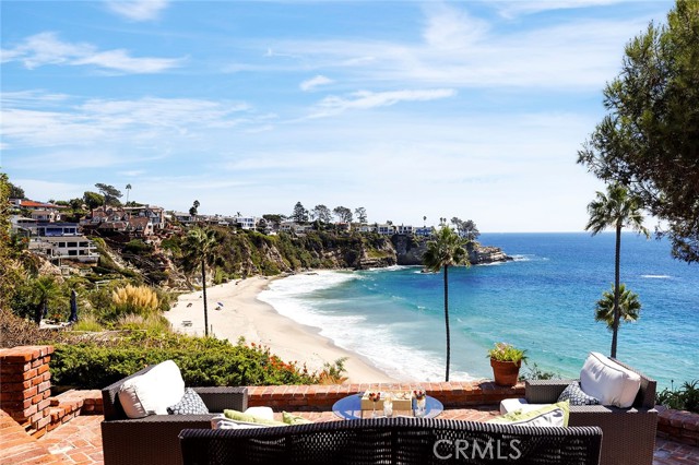 Nestled on one of the largest parcels in Three Arch Bay, this oceanfront home showcases breathtaking views of Whale Rock, the Pacific Ocean and Catalina Island.  Ideally situated at the north end of the cove, this home offers exceptional views of the spectacular beach below. A wonderfully planned home built with family living in mind, 24 S La Senda boasts oversized living spaces for entertaining and time well spent with those you love. Completely rebuilt in 1984, this incredible home has 4 bedrooms and 4 bathrooms and a beautiful home office with spectacular views of the cliffs of Three Arch.  A well planned kitchen with counter dining and a center island, Sub Zero refrigeration and a chef's gas range with copper trimmed hood this kitchen is made for large parties! A large Butler's Pantry and enormous laundry and sewing room complete this service area. Venture outside to the expansive entertaining decks and ample yard space perched just above the private beaches that make this neighborhood so special. A side gate in the backyard offers the perfect escape down to the beach. Three Arch Bay is one of Southern California s most coveted private waterfront communities. Featuring a quarter mile long stretch of pristine white sandy beach, private coves, 24-hour gated security, kids play area, clubhouse and tennis courts.