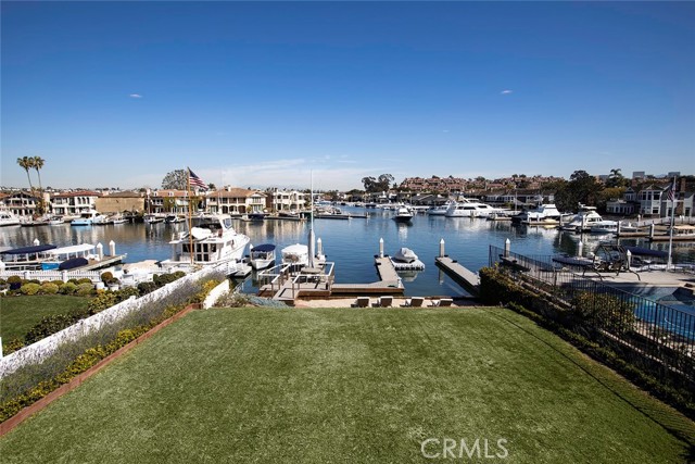 Welcome to the most exclusive and coveted island community in Southern California. Escape the mundane at your personal oasis, 11 Harbor Island, featuring 50  of water frontage, a private boat slip for up to a 57  yacht, and stunning coastal views. Enjoy your mornings taking in the tranquility of calm waters reflecting their surroundings as if Monet himself had brushed the water s surface. Relax as the glow of evening s sunsets gives way to sparkling city lights. Truly a rarity in bay front living, the home features an expansive lawn and beach. Appreciate the immaculate 3 bedroom, 3 bathroom home or create your one-of-a-kind vision. Ideally situated with views down the channel, the leeward side of the island offers protection from the elements and a privacy unparalleled in any other location in the harbor. A once-in-a-lifetime opportunity to live the dream.
