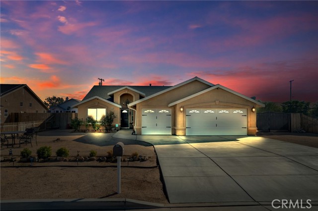 Gorgeous upgraded single-story home with 4beds and 3baths. The home is located in the greater part of California City. This large open floor plan with vaulted ceilings is fantastic for entertaining. A large kitchen with beautiful granite counter tops, updated stainless steel appliances, and recessed lighting. A huge master suite with a walk-in closet, large master bathroom, walk in shower and separate tub. The backyard is pristine with a covered patio. This house is a gem and won't last long. Call your favorite realtor today and schedule a showing!