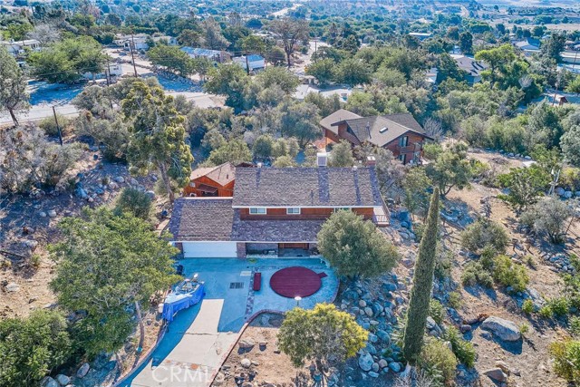 This 3.1 Acres(135,036 SQFT) of a stunning estate has an amazing view of the canyons, hills, & Isabella lake. Your Family and friends can enjoy the Isabella Fishing Derby from April to July. The Trail of 100 Giants and 1500 year old redwood trees are just 35 miles north of KernVille. In Winter season you can ski at Sherky Meadow which is 10 miles away, and bathe at Miracle Hot Hot Springs 13 miles away. And, every year on the President's day Kern River Whiskey Flat holds an event full of fun for the day  .  It is a perfect second home or vacation house for a family that wants to get out of the city and enjoy the serene nature of their own estate. It is perfect for any religious churches to use their prayer house as well.  The 3 bedroom, 2 Bath and 1 office room of the 1,923 Sqft house has a Fireplace, ground pool, own Well, City Electric, Large Propane gas tank installed and from the patio you could enjoy all the beautiful views of the city of Wofford heights.