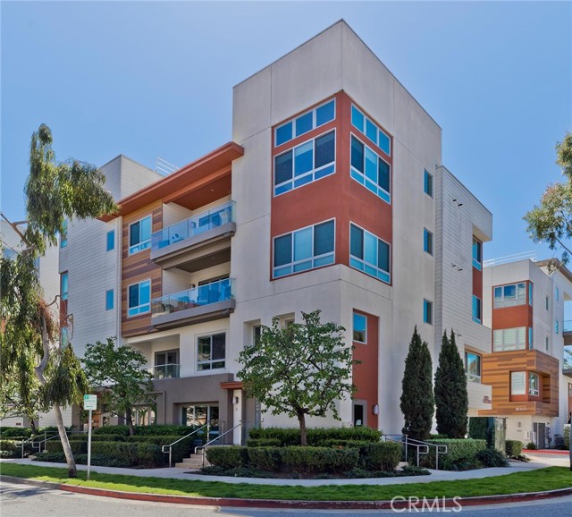 This mix of modern and traditional condo is an ideal home  in Playa Vista, a one-of-a-kind community in Los Angeles! A coveted two floor floor unit, this home features an entertainer s kitchen with a flowing floor plan into dining and living rooms with a private deck, a striking main bedroom suite, hardwood floors, custom Hunter Douglass window treatments, Nest thermostat, 10  ceilings, and more Direct entrances are available through the two-car garage or front door, and there is also building access up an elevator  to second floor. The ground floor offers a bedroom and full bath, along with a large mixed-use room, great as an office, play space or TV room. A large storage closet is also available. Walk up the stairs to a large open space on the second floor, with distinct dining and living spaces along with the kitchen, which features plenty of counter space and a large pantry with built-ins. Big windows offer lots of light and a balcony is perfect for lounging and a grill. The master bedroom is secluded on one side of the home, with a large closet with built-ins and a luxurious bathroom with a soaking tub and separate shower. The other side of the unit features two bedrooms with a shared bathroom, along with the laundry room. Please note that the property is currently leased till mid March of 2023. The private two-car garage offers an EV charger.  Situated in Playa Vista near Runways  Whole Foods, restaurants, Cinemark and Cedar-Sinai. Enjoy 30 parks, gyms, pools and a weekly Farmer s Market. Located close to the Beach, 405 and LAX, you never have to leave the area. There is currently a tenant in the unit through March 6, 2023. All viewings must be scheduled over 24 hours in advance. Do not disturb the tenant.