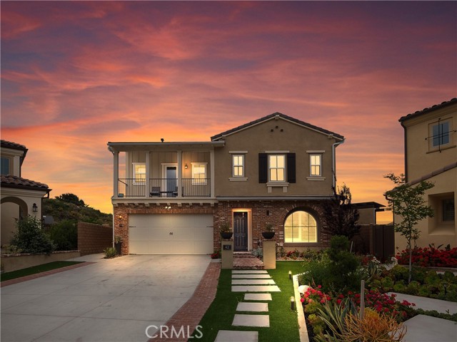 Welcome to modern luxury living with 110' of panoramic view of rolling hills, city lights and a beautiful sunset. This magnificent custom 4bed/4 bath, family-friendly home is situated on a quiet cul-de-sac street in the prestigious Skyridge community. Easy access to Toll roads and major Fwy. Minutes to Elementary school, multiple biking and walking trails and nearby a brand new 6.3 acre park which features pickleball courts, along with sand volleyball courts, playground area, a soccer field and a dog park. This beautiful 2-story home features spacious living space with lots of windows and large, multi-panel sliding glass wall leading you to the California room for more entertainment space for your guests. Sleek modern kitchen with huge quartz countertop and beautiful stainless steel appliances is a chef s dream. The master suite has a retreat space as well as a large balcony that overlook a tranquil view. Every detail is accounted for in this self-sufficient and fully automated home which can be adjusted to your liking. This home boast full amenities and impressive CUSTOM OUTDOOR ENTERTAINMENT: 4kw solar panels, two Telsa Power walls (for battery backup/night use or a combination of both to generate power off-grid), drought-tolerant landscaping on a smart drip system, low voltage landscape lighting, modern vases throughout the yard, large outdoor gas fire pit with plenty of sitting, BBQ area (equipped with BBQ, large burner, TV, beer keg, trash bin, and faux wood vinyl covering), custom built-in POOL and spa, vinyl fence (to separate the grass area and pool area for safety), full home water softener, 6 stage alkaline RO drinking system to fridge, two security camera systems (cctv and ring), finished garage with epoxy floor and built-in storage, full voice-activated smart home (except in three secondary rooms). Also included are custom built-ins, custom tile work, 3D accent walls, and hidden storage space for your personal items. FURNISHED OPTIONAL. MUST SEE!