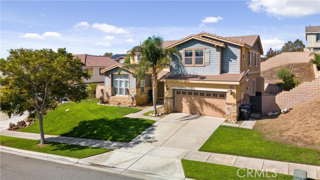 Welcome to this 2-story executive home located in the highly desirable neighborhood of Coyote Canyon & part of the Award winning Etiwanda School District. The entry way opens up to a light & airy living room with vaulted ceilings adding to the grandeur of the place & allowing plenty of natural light to flow in. Adjacent to the formal living room is a generous sized formal dining room. The kitchen features stainless steal appliances, rick granite counter tops that contrast perfectly with the mocha cabinets, plenty of cabinet space, a walk in pantry and a kitchen island that doubles perfectly as a breakfast bar. The kitchen opens to another family dining room & large family room centered by the fireplace. There is a full bathroom & bedroom/office on the first floor. The upper level centers around a large loft located between the bedrooms & shares sublime city light views. The generous sized master suite opens up to a bathroom with dual vanities, walk in shower & tub as well as very large walk in closet. Another upstairs bedroom has an EnSite bathroom with beautiful mountain views. The two additional bedrooms also have mountain views & they share the final bathroom. Additional features include a garage, laundry room, and a spacious backyard that offers plenty of space to entertain while being very easy to maintain.