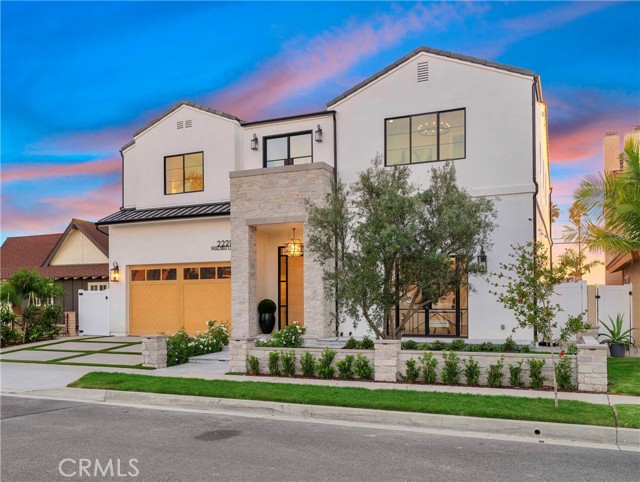 Enjoy OCEAN VIEWS from this impeccable and chic, NEW CONSTRUCTION custom residence offering modern living and show-stopping ocean views in a coveted Huntington Beach location! The contemporary exterior alone will entice you to explore the 5,000+-sq ft, 5-bedroom, 5.5-bath layout, making you realize there s room for everyone. Gorgeous white oak on the 9-ft pivot entry door and wide-plank flooring accentuate a stunning open-concept interior. In the living room, soaring exposed-beam ceilings are anchored by a stone fireplace surround and bespoke built-in shelving. Grab a selection from the dining room s glass-enclosed wine cabinet and head through the expansive La Cantina sliders to enjoy alfresco meals on the patio. Equal parts beautiful and functional, the kitchen is equipped with quartzite slab countertops, a multi-seater island, marble backsplash, top-of-the-line stainless steel appliances, soft-close cabinetry, and a butler s pantry with a service kitchen. Take the custom wood stairs or elevator upstairs to find a bonus room crafted with a wet bar, an ensuite, and a balcony where you can sip a nightcap as you watch the sunset over Catalina Island. Another balcony awaits you in the primary suite, along with a must-see walk-in closet, a fireplace, and a spa-inspired 5-piece bath. Host cookouts in your large backyard, presented with a BBQ and a covered patio for guests to enjoy. All of this is just moments from award-winning schools, shops, dining, beaches, trails, and more.