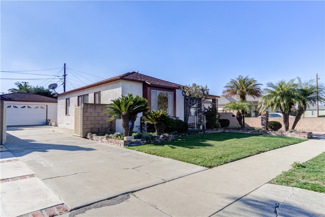 Nestled within the very walkable westside Gardena Neighborhood of 90249 (McCarthy), this 4 bedroom 2 Bath.  Has 1 additional room that could be used at a bedroom.  Home has so much to offer a family looking for high rated schools (Chapman Elementary 8/10), amazing neighborhood parks, (Bodger Park, Alondra Regional Park and Golf Course) plenty of Shopping Malls and Entertainment Centers (Del Amo Fashion Center), most importantly, a clean, safe walkable neighborhood.  This house built in 1952 is in amazing condition and has plenty of space for large and growing families including, original hardwood flooring within 3 of the Bedrooms and the front living room, 2 large Bathrooms with plenty of space, a large kitchen that leads to an outdoor covered patio, a spacious family room, 2 long and wide drive ways (6-8 Cars or RV/Boat Parking), 6200sqft lot size, and a large 2.5 car garage with automatic garage door opener.  This house has loads of potential for customization and expansion.