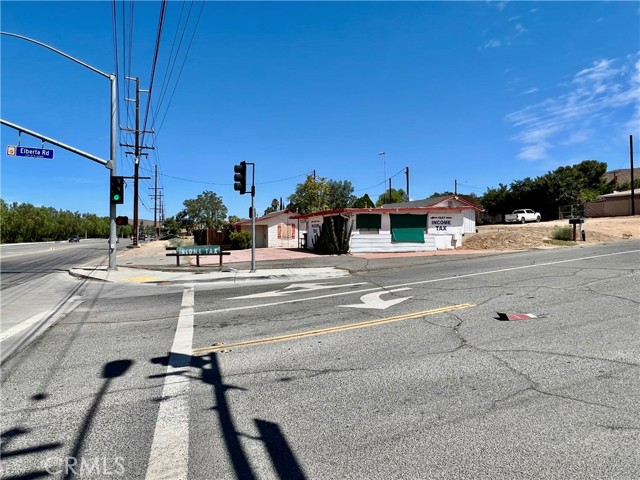 Property is Residential use-Commercially zoned. Two structures on this corner lot property on Mission Trail. Property is sold as-is.