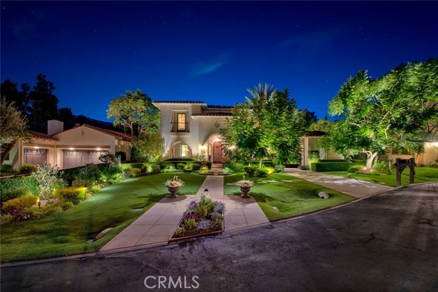 Situated on an Elevated Cul-De-Sac within the Gated Community of Emerson in Tustin Ranch, 10604 Sumter Way is a Turn-Key Dream Estate. This Custom Home Showcases Five Bedrooms, Four and a Half Bathrooms (One Bedroom and Full Bathroom Located on Main Floor), Designer Hardwood Floors, High End Stereo/Security System, and Immaculate Entertainer s Dream Backyard. The Gourmet Kitchen Enjoys Custom Solid Wood Cabinetry, Quartz/Granite Counters, Custom Tile Backsplash, Large Island with Seating, High-End Built-In Appliances, Two Subzero Wine Refrigerators, Breakfast Nook, and Oversized Pantry. The Kitchen Opens to the Family Room with a Custom Coffered Ceiling, Cozy Fireplace, Built-In Entertainment Center, and Backyard Access Which is Perfect for Entertaining. The Main Floor Features an Office Nook, Adjacent to the Main Floor Bedroom with Built-In Desk, Backyard Access, and Full Bath. The Spacious Master Suite Enjoys a Sitting Area with Built-In Bookshelves, Fireplace, Built-In Cabinets, and Private Balcony with Backyard Views. The Master Bathroom Includes Dual Vanities, Make-Up Vanity, Walk-In Shower, Separate Tub, and His/Hers Cedar Lined Walk-In Closets. The Upstairs Bonus Room Features Wainscoting, Built In Speakers, and Balcony Access. The Private Backyard Has Been Professionally Landscaped by Roger s Gardens, Complete with a PebbleTec Pool & Spa, Water Feature, Baja Shelf, Electric Awnings, Covered Patio, Large Turf Area, Fruit Trees, and Night Lighting Throughout. The Additional Patio Space Includes a Pergola, Built-In Lynx BBQ, Mini Fridge, Fireplace, Insulated Cooler, and Multiple Seating Areas. The Gated Porte Cochere Leads to a Direct Access Two Car Garage with Epoxy Floors and Built-In Cabinets. The Detached Third Car Garage (Currently an Art Studio) Features Built-In Cabinets, Wall A/C, and Outdoor Sink. Conveniently Located Second Floor Laundry Room with Built-In Cabinets and Sink. Additional Upgrades Include LED Lighting, Whole House Water Filtration System, E-Piping, New Electric Porte-Cochere Gate, & More! Award Winning Tustin Unified Schools: Peters Canyon Elementary, Pioneer Middle, Beckman High. Easy Access to the Toll Roads, 5 Freeway, Peters Canyon/Irvine Regional Parks, Tustin Ranch Golf Course, and Numerous Hiking & Biking Trails. Do Not Miss Out on 10604 Sumter Way!