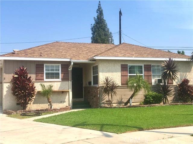 This lovely single story home is located at the end of a cul-de-sac on one of the largest lots in the development.  The yard size could fully accommodate an Adult Dwelling Unit or Granny Unit (if approved by the city).  The backyard with its many palm trees has a fully automatic sprinkler system.  The extra long driveway which leads to the two car garage can handle many vehicles and there is an area for RV parking.  This home features three bedrooms and one bathroom.  The eat-in country kitchen with granite countertops boasts a small desk and pantry area.  Relax in the spacious family room with a floor to ceiling brick fireplace, built-in bookshelves, exposed wood beams and expansive windows.  Inside laundry.  Close to shopping, schools and freeways.  Come buy!!