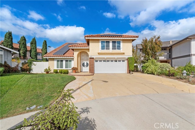 AN ENTERTAINERS DELIGHT! Welcome to 801 San Simeon Circle, a beautiful 2,829 square foot 2-story Placentia home located on a peaceful cul-de-sac in the Placentia Village Estates community. As you enter through the beautiful front door and step inside this lovely home, you are greeted by a bright and spacious living room with vaulted ceiling, formal dining room with mirrored wall/beautiful lighting (and slide-away privacy door) perfect for quiet family dining and special occasions, and an open staircase accented by a gorgeous chandelier. The downstairs also boasts a large kitchen with ample cabinets and generous counter space, center island, dishwasher, unique indoor grill, walk-in pantry, and perfectly arranged kitchen sink window overlooking the impressive backyard. The kitchen is open to the kitchen dining area (perfect for a large kitchen table), wet bar area with sink, and cozy family room with gas fireplace (perfect for family gatherings). The large windows/sliding glass patio door invite you outside to relax in the stunning backyard perfect for swimming, basketball, BBQ, and entertaining family and friends. The downstairs boasts a bright indoor laundry room with window door for side-yard access, guest bathroom with shower, and direct access to a large 2-car attached garage with beautiful epoxy floor. As you walk up the open staircase to the upstairs hallway, a large collection of built-in cabinets offers an abundance of storage. The spacious master suite overlooking the beautiful backyard includes a walk-in closet and separate additional closet; full bathroom with dual-sink vanity and large tub/shower; and a decorative faux electric fireplace perfect for relaxation, ambience, and cozying up to for reading that perfect book. The second floor boasts two spacious bedrooms; an additional full bathroom with dual-sink vanity; and an oversized impressive bonus room with gas fireplace and built-in sink/refrigerator. Other amenities include solar panels, dual-pane windows, recessed lighting, and fruit-bearing lemon and tangerine trees. This delightful and unique Placentia home is located less than a mile from the Placentia Library, City Hall, Police Station and Alta Vista Country Club; offers convenient access to the 57 and 91 freeways, Cal State Fullerton, shopping, and more; and is located in the excellent Placentia-Yorba Linda School District (John O. Tynes Elementary School, Kraemer Middle School, and Valencia High School). No HOA and no Mello Roos.