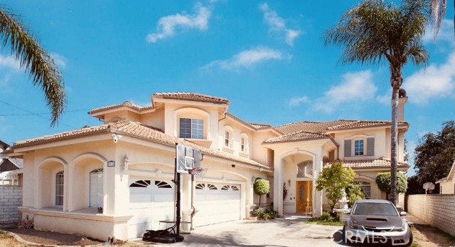 Gorgeous house, 3,870 sqft building area sitting on a 9733 lot size. After 2001, the year that his house was built, City no longer allowed any other building permit that exceeds 3,500 sqft, making this house a one-of-a-kind. Located in the highly sought-after San Gabriel, this house sits right on the border of Temple City, so the occupants' young ones can attend Temple City Unified School District. Entering the house, the first thing you will see is its beautiful high cathedral-like ceiling, along with many windows, allowing plenty of natural light to pour in. The house comes with a double door, 5 bedrooms & 4.5 bathrooms. Large living room with huge fireplace and elegant chandeliers. Connected to the living room is the formal guest dining area for special occasions. As every bedroom in this house has its own bathroom, it can be considered as 5 master bedrooms within the property. Spacious kitchen with granite countertops and huge granite island, featuring top-of-the-line appliances. Massive family room in the corner of the house with lots of room for gathering of family or friends, watching movies, playing games, karaoke, or even dancing. One suite downstairs for guests or the elderly with its bathroom having a bathtub inside, and a walk-in closet. Upstairs, you can find an enormous, double-doored, wide main master bedroom containing a large walk-in close and a beautiful spacious bathroom with granite countertop double sink, shower stand next to a beautiful spa, and its own private toilet. The house also has a large laundry room, with enough space for ironing clothes. The home boasts 2 separate sets of impressive staircases that leads to the second level, one from the living room and one from the kitchen, for the occupants' conveniences. Along with that, the house also has 2 AC units for each level to ensure cool air throughout the whole place during hotter weathers. Spacious attached 3-car garage; not only that, the big driveway in front of the garage has enough space to park 6 cars. The huge lot size encompasses enough space for a permit to build an ADU or a swimming pool for BBQs in hot summers under a beautiful concrete patio. The huge backyard also has a big avocado tree and some other fruit trees. The entirety of the lot is surrounded by block walls and iron fences. On top of that, the house is also near the shopping district, schools, restaurants, grocery stores, making it an extremely convenient and favorable location to live in. It's a MUST-SEE!