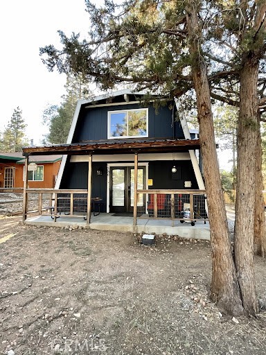Sweetest in Sugarloaf! This modified Gambrel A-Frame is just stunning. You will fall head over heels when you enter this wonderfully renovated mountain getaway! Offering you the perfect blend of rustic Big Bear charm with modern amenities & the highly sought-after  mountain modern  design that captivates so many of us. This charming cabin boasts 2 bedrooms, 2 full bathrooms & a loft bedroom that are tastefully decorated & comfortably spacious. Downstairs boasts a modern kitchen featuring concrete countertops, beautiful appliances & a coffee bar.  The open-concept family room has vaulted T&G open beamed ceilings & a cozy fireplace.  It s a comfortable space for you & your guests to create wonderful memories. There s one bedroom & full bath on the main level with the primary bedroom with en suite & loft bedroom upstairs. Step outside on the covered deck to enjoy the fresh air or play on the oversized lot. There is ample room for parking and all of your toys on this large parcel. All the creative hard work has been done for you on this one. Make sure to put this one on your list as it will check all of the boxes and then some!