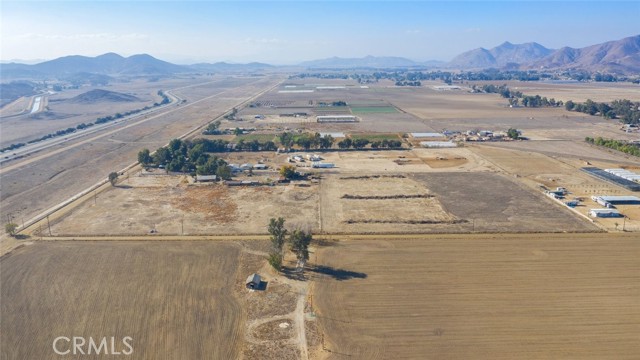 NEED LAND with Utilities?  Enjoy Country Life on over 9 Acres of Flat Useable Acreage.  Many potential land uses.  Fast Growing Area Near Menifee, Temecula and Diamond Valley Lake.  Beautiful views of hills and mountain ranges.  Make an appointment to view the property today.