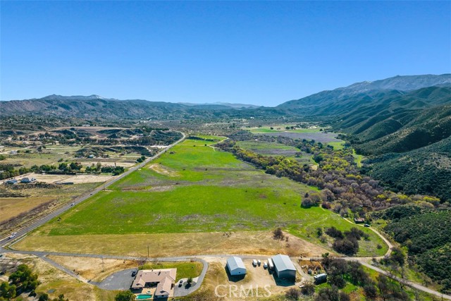Once in a lifetime Opportunity!  This ranch has a total of 478.87 acres in 10 parcels zoned RR. The water rights on this property are incredible. There are a total of 7 wells, 2 of them are capped off and other 5 are pumping 400-1000 GPM.  Many things have been grown on the property, and many cattle have been raised here.  Currently, there is garlic and bees.  Cottonwood Creek & Temecula Creek run through the property.  There is a full size roping arena, chutes and 25KW lighting.  There are currently 2 homes on the property that will be sold as-is. The property is mostly all flat and usable.  Close in to Temecula wine country.  This type of property is very rare and has been in the family for many years.