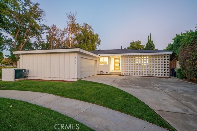 Welcome to this completely remodeled mid century home located in the heart of Valley Glen. You'll immediately notice the open floor plan featuring a seamless transition from the outdoor gathering area to the living room, dining room, and kitchen. The primary suite boasts 2 spacious closets, and a beautiful en suite bathroom with 2 shower heads and stunning custom tile work. Features include stainless steel appliances, 3rd generation NEST learning thermostat, quartz countertops, soft close white shaker cabinets, and recessed lighting throughout the home. Enjoy cooking in the stunning kitchen featuring a large island with quartz countertop and seating for up to 4 guests, stainless steel range, stainless steel wine fridge, stainless steel microwave drawer, farmhouse sink, stainless steel fridge, and abundant cabinet space. Step into the backyard featuring a deck and beautiful grass area.  Priced to sell; come see this house today!