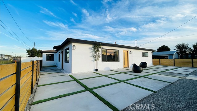 Look no further! This is a incredible chance to own a one-of-a-kind remodeled home designed with a you in mind. The property is in close proximity to the 605, 210 and 10 Freeways, restaurants and shops! The house is very much like a new build with, new A/C, new 200AMP electrical panel, and 220 volts charger for your electric vehicle needs. It also has a bonus room that can be used as an office or a nursery area. The house was completely repiped and redrained, full electrical rewire and recessed lights were added throughout. Open concept brand new modern kitchen perfect for entertaining! The kitchen was remodeled with white shaker cabinets, black matte hardware, quartz countertops and brand new stainless steel appliances, including a stainless steel sink with garbage disposal and soap dispenser. Beautiful vinyl floating floors were installed throughout the house. Both bathrooms have beautiful eye catching tiles, shampoo niches, modern LED mirrors, and bathtubs! All bedrooms have brand new lighting. The bathroom has a walk in shower with beautiful grey tiles, marble look floor, and LED mirrors. Exteriors are concrete landscaped with extravagant detailed outdoor living. Made to entertain. Come see before is too late!